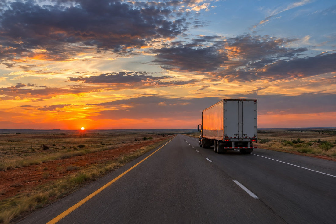 Semi truck in the right lane on an Oklahoma interstate at sunset - Oklahoma Left Lane Law